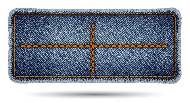 Denim blue jeans label with orange stitching on plain surface