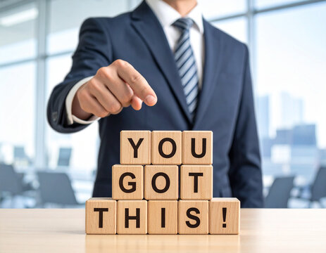 You got this! - Geschäftsmann zeigt auf den Text "You got this!"