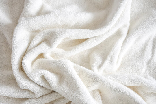 Close-up Texture of Wrinkled White Terry Towel Fabric Background