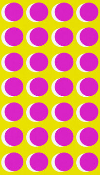 Abstract pattern with pink polka dots on yellow background