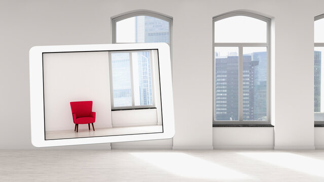 Tablet showing 3d rendering of red armchair in an empty room
