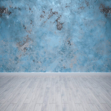 Empty room with blue textured wall and wooden floor
