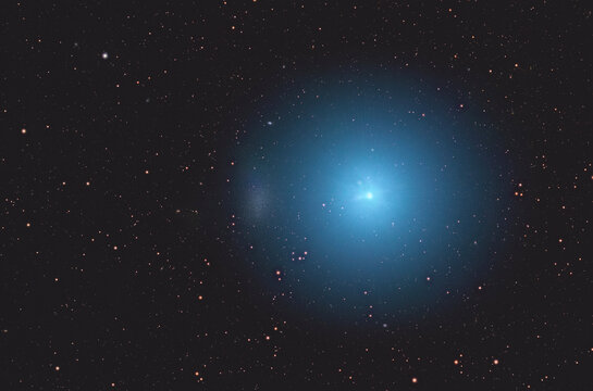 Bright star Regulus and Leo 1 dwarf galaxy in night sky