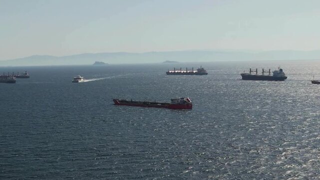 Aerial View of Large Vessels Navigating the Strait of Hormuz, A strategic point for Iran. 