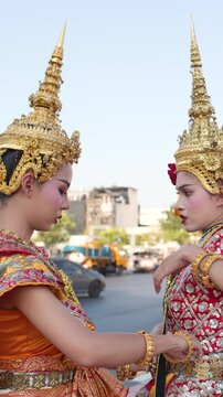 Traditional Thai Khon Dancers Adjusting Costumes Outside Wat Suthat Temple