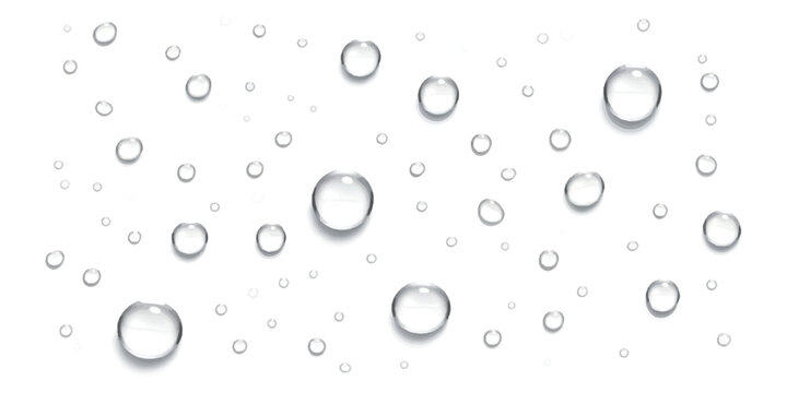 Clear water drops and rain bubbles spread on a surface