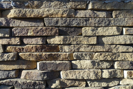 Texture of rugged dry stack stone veneer wall