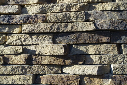 Texture of rugged dry stack stone veneer wall