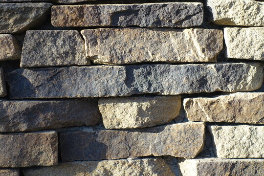 Texture of rugged dry stack stone veneer wall
