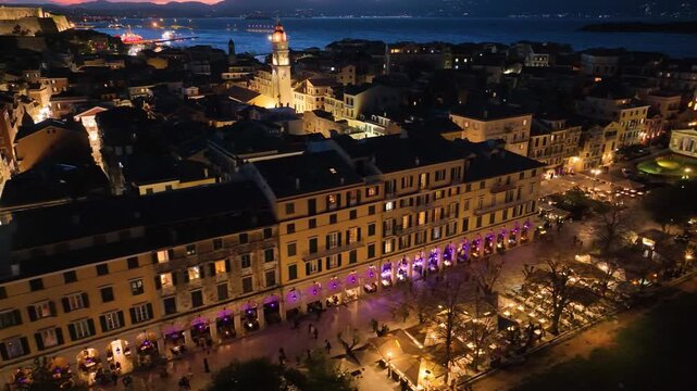 Aerial Drone Night View of Illuminated Liston Square and Saint Spyridon Church in Corfu Greece