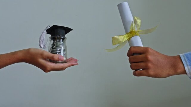 Side-by-side presentation of graduation certificate and educational fund jar