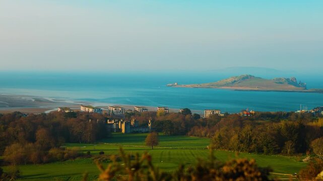 Howth Castle with Ireland&rsquo;s Eye in Background During a Beautiful Golden Hour