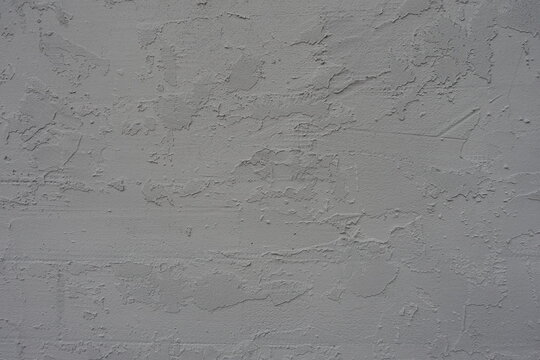 Texture of gray wall with troweled dash stucco finish