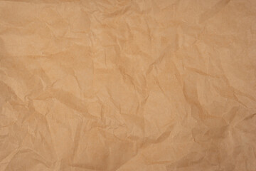 Fototapeta premium Crumpled paper as background. Top view.