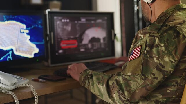 U.S. military operator in headset monitoring offensive launch operation in Iran