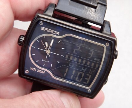 SANDA black dual display wristwatch showing time and date