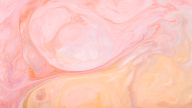Abstract marble paint texture with soft pink peach and cream swirls flowing background