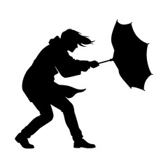 Silhouette of a person struggling with an inverted umbrella blowing in a severe wind storm © ZamStock