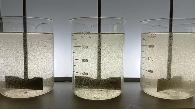 Jar Test Sequence: Close Up View of Three Jars Ending Flocculation Phase at 40 RPM