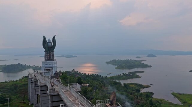 Aerial view of kujang kembar monument at sunset overlooking dam