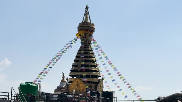 Swayambhunath Stupa Golden Spire and Prayer Flags in Kathmandu City, Nepal
