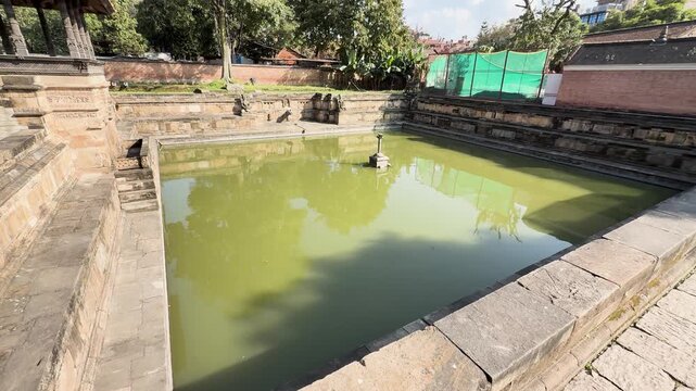 Historic Stone Water Tank and Sunken Bathing Pool in Lalitpur, Nepal