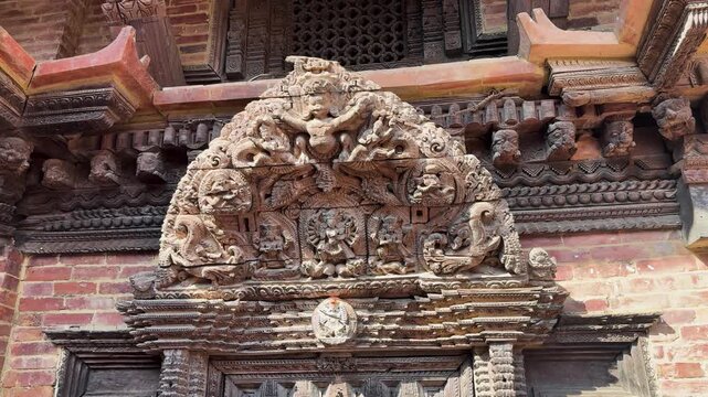 Wooden Tympanum Carvings Above a Doorway in Patan Durbar Square, Lalitpur, Nepal