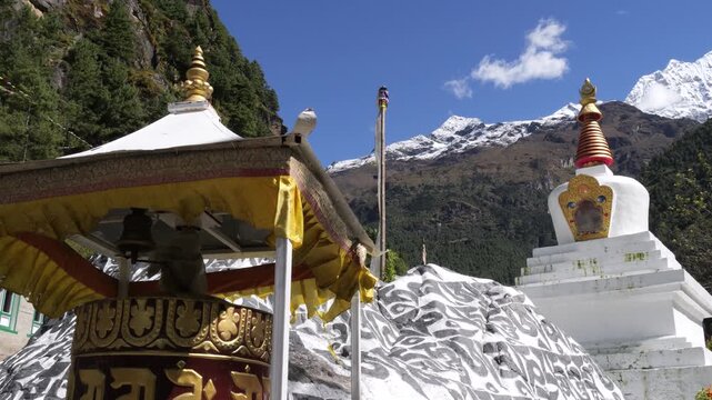 Traditional Prayer Wheel and Stupa with Himalayan Mountain Backdrop, Nepal