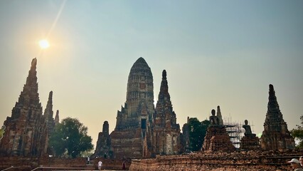 Fototapeta premium Ayutthaya, Thailand :Sunset view of Wat Chaiwatthanaram temple ruins with the Grand central Prang, the Unesco World Heritage site of Ayutthaya Historical park.