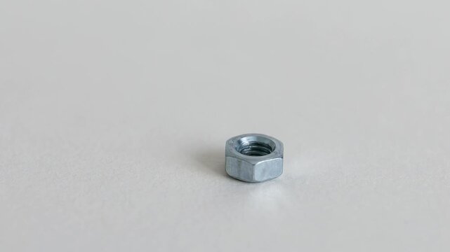 Hex Nuts on White Background Close Up Industrial Fastening Components