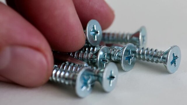 Self Drilling Phillips Countersunk Screws on White Background Close Up