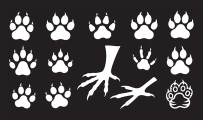 White Animal Paw Prints and Bird Claw Tracks Vector Set on Black Background © crea8ive