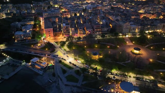 Aerial Night View of Spianada Square and Historic Old Town Architecture in Corfu Greece Illuminated Cityscape Drone