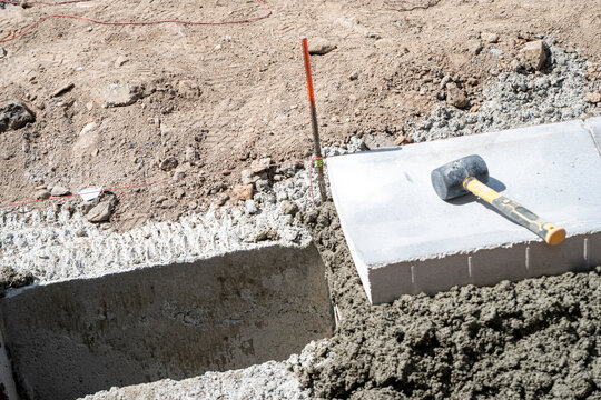 Pavement construction with tools and fresh cement The Concept of groundwork