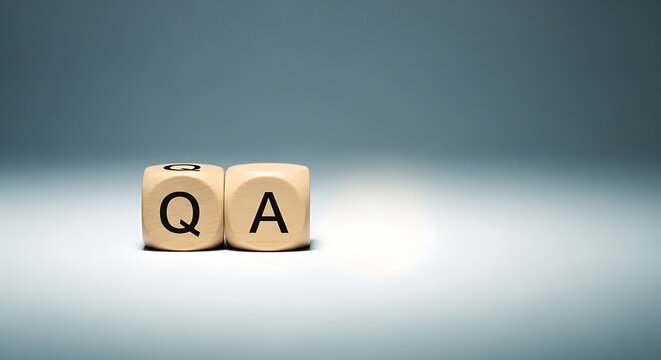 Wooden Blocks with QA Letters on a Blue Background, Symbolizing Quality Assurance Concepts in Business and Technology