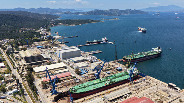 Aerial drone photo of port town and recently renovated ship yard of Skaramagas in Western area of Attica, Elefsina bay, Attica, Greece