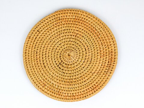 Rattan woven placemat isolated on white background