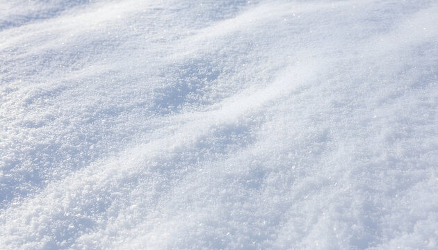 Windswept fresh snow surface with glittering ice crystals texture.