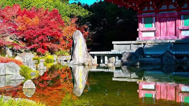 静寂を彩る秋の調べ。池に映る五重塔と、燃ゆる紅葉の共演。
「願い、色づく。一願成就の寺に咲く秋の絶景。」
熊本県玉名市　蓮華院誕生寺（奥之院）
The melody of autumn colors the tranquility. The five-story pagoda reflected in the pond, adorned with the vibrant autumn leaves