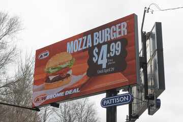 Naklejka premium road-side digital pylon out-of-home billboard on Leslie Av for A&W fast food restaurants, Toronto