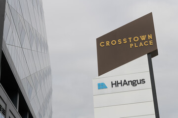 Naklejka premium roadside tenant directory at Crosstown Place identifyin office occupants, including H.H. Angus and Associates Ltd., engineering consultants, within the multi-tenant office building at 1176 Eglinton Av