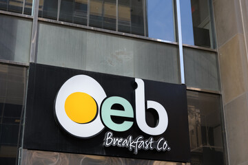 Naklejka premium building facade and sign of OEB Breakfast Co located at 20 Toronto St, Toronto