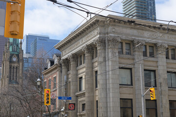 Obraz premium exterior of historic bank branch of the Canadian Bank of Commerce, designed by Darling and Pearson, 1907, at 144 King St E, at Jarvis St, Toronto