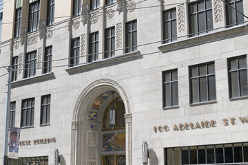 Fototapeta premium historic 1928 Art Deco façade and signage of the Concourse Building, designed by Baldwin and Greene, incorporated into the EY Tower at 100 Adelaide Street West, Toronto