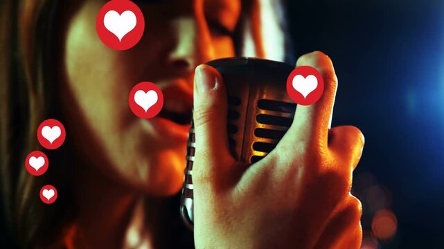 Female singer singing into vintage mic, sparking rising red hearts overlaying mic for music promo