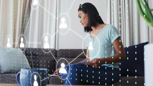 Woman reaching for laptop while holding papers for business, starting nodes, matrix filling frame