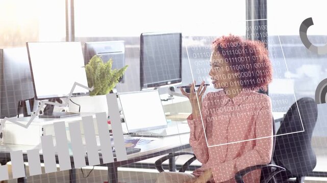 Vertical video: Phone ringing, woman in pink blouse discussing charts on phone at desk, copy space