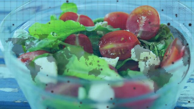 Camera pushing in, bowl settling, showing tomatoes and cheese with map overlay sharpening, food ads