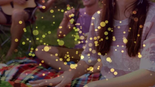Woman drumming and singing, hands tapping bongos starting music jam, golden bokeh partly obscuring