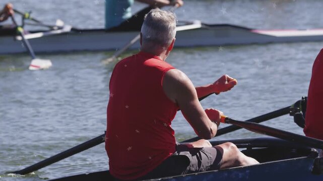Male rower ending drive recovering adjusting orange grip moving shell with overlay tracing blade